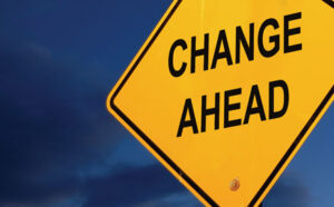 Street sign saying change ahead